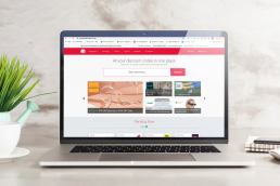 MyVoucherCodes homepage on a laptop