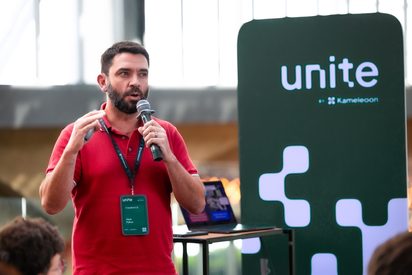 Mark Pybus of Creative CX presenting on problem-first experimentation at Unite Paris.